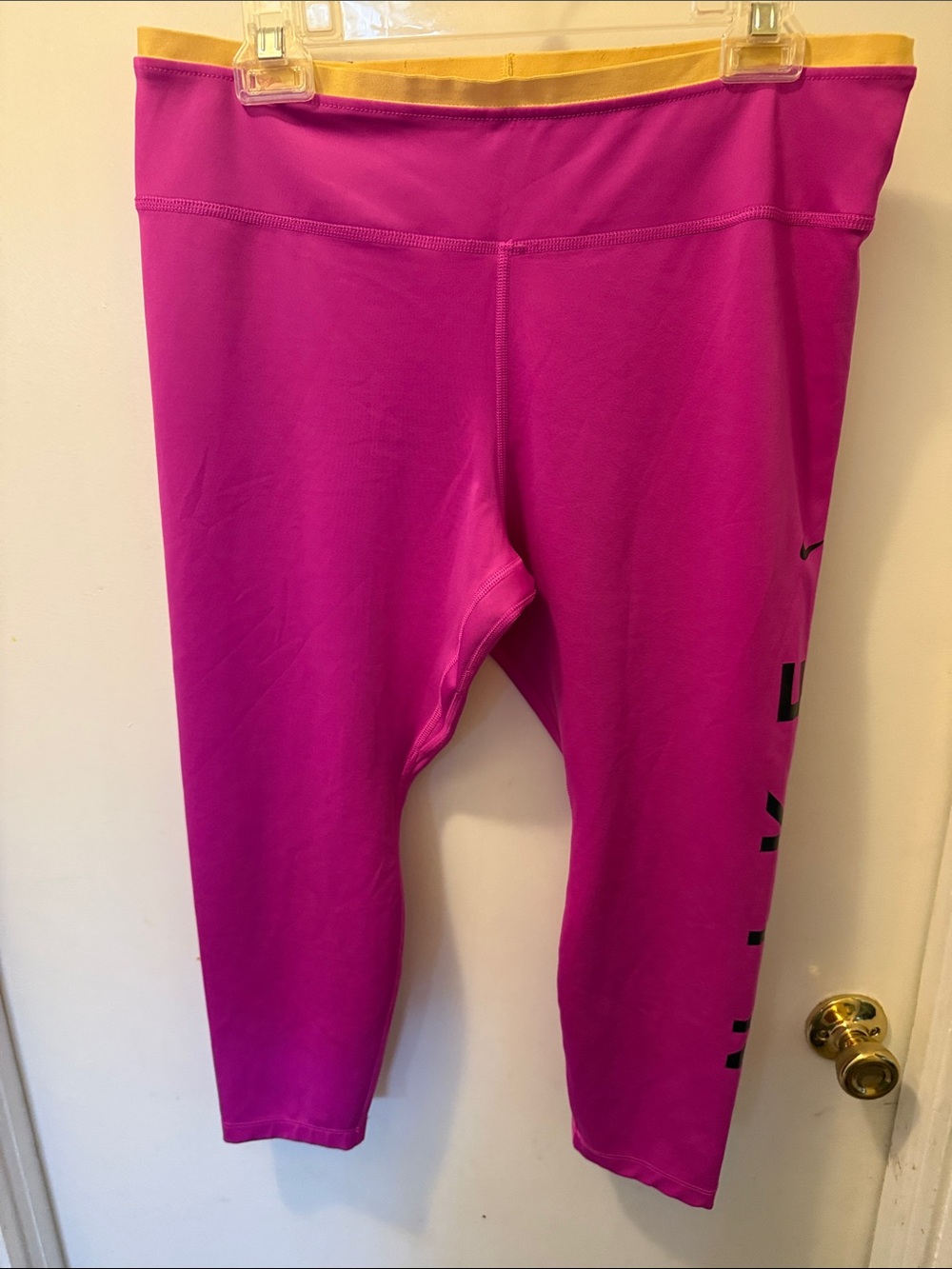 Nike Magenta Leggings with Yellow Waistband Nike logo down leg